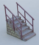 Wide stone steps with handrails