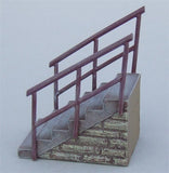 Wide stone steps with handrails